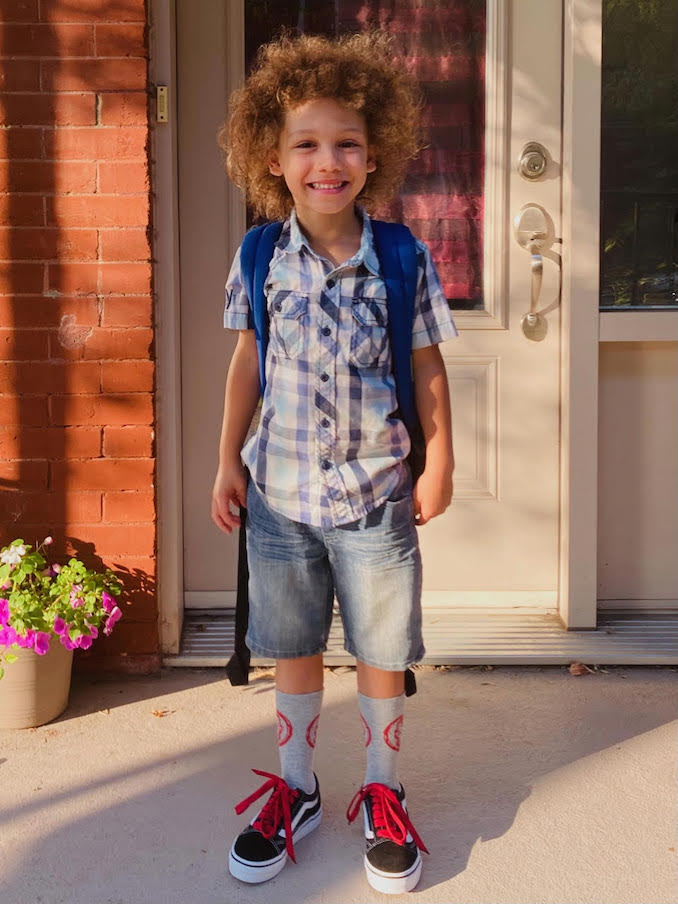 I go to school with my son. Here, first day of first grade!