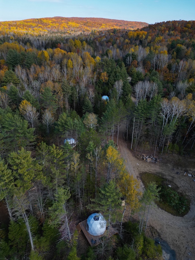 Wildwood Nature Escape drone photograph of their glamping domes.