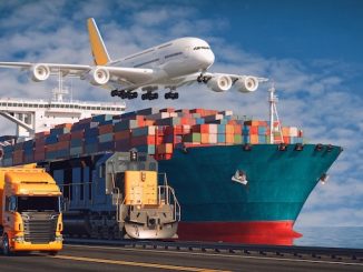 Shipping containers in boat with plane overhead.