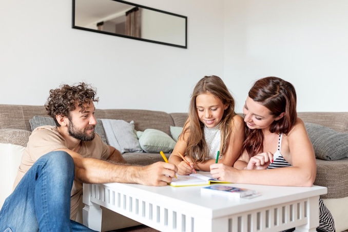 family hanging out together in their living room.